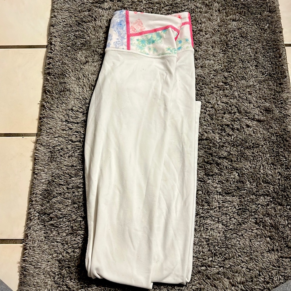 White lululemon leggings with flower band